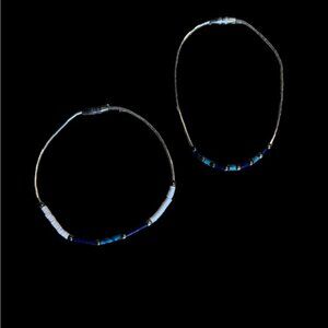 Set of 2 Navajo made sterling and stone bracelets.
